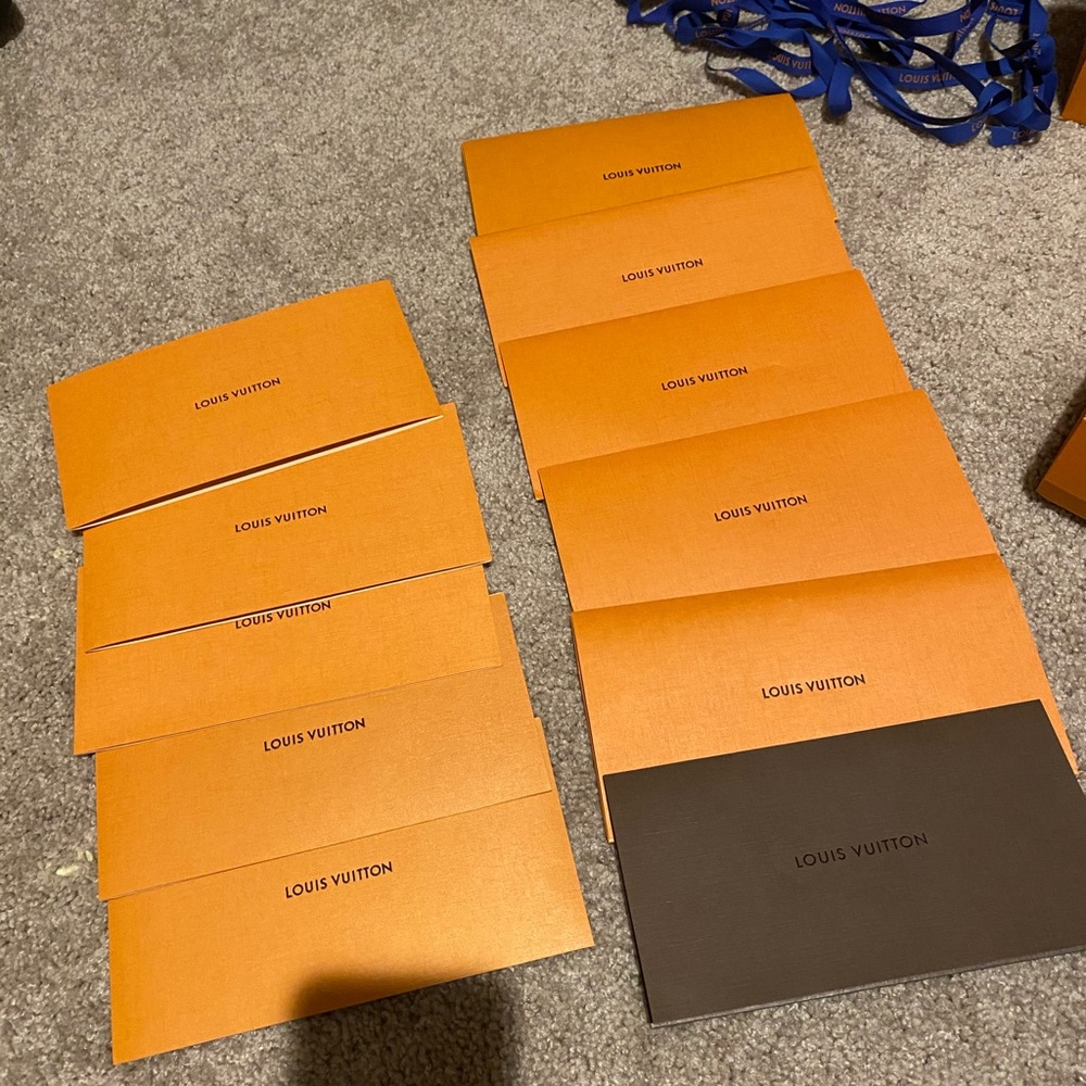 Huge bundle of Louis Vuitton receipt folders